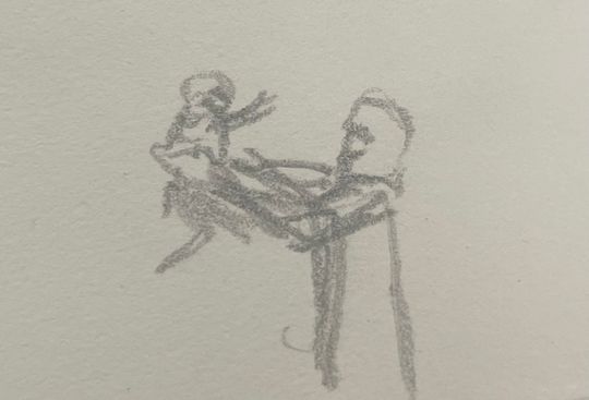 Soulful and living baby in loving fathers arm