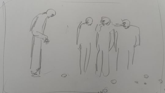 Old men playing boules /balls outside the studio