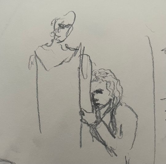 Child holding to mothers arm