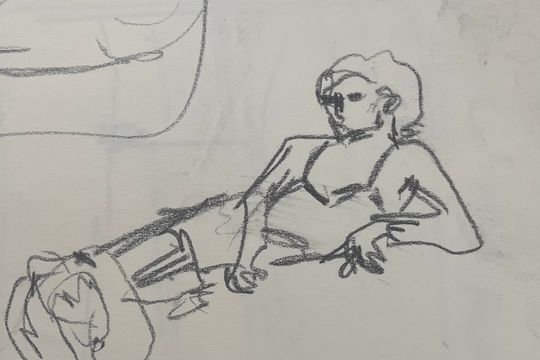 Girl leaning on sofa